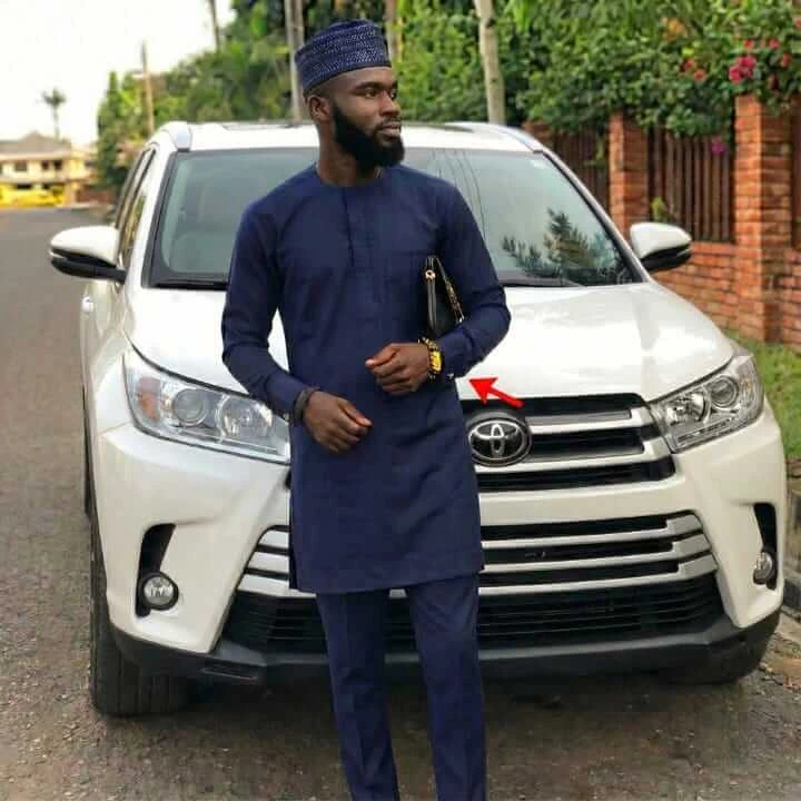 Zenda customer with his SUV, Pixiu bracelet on his wrist