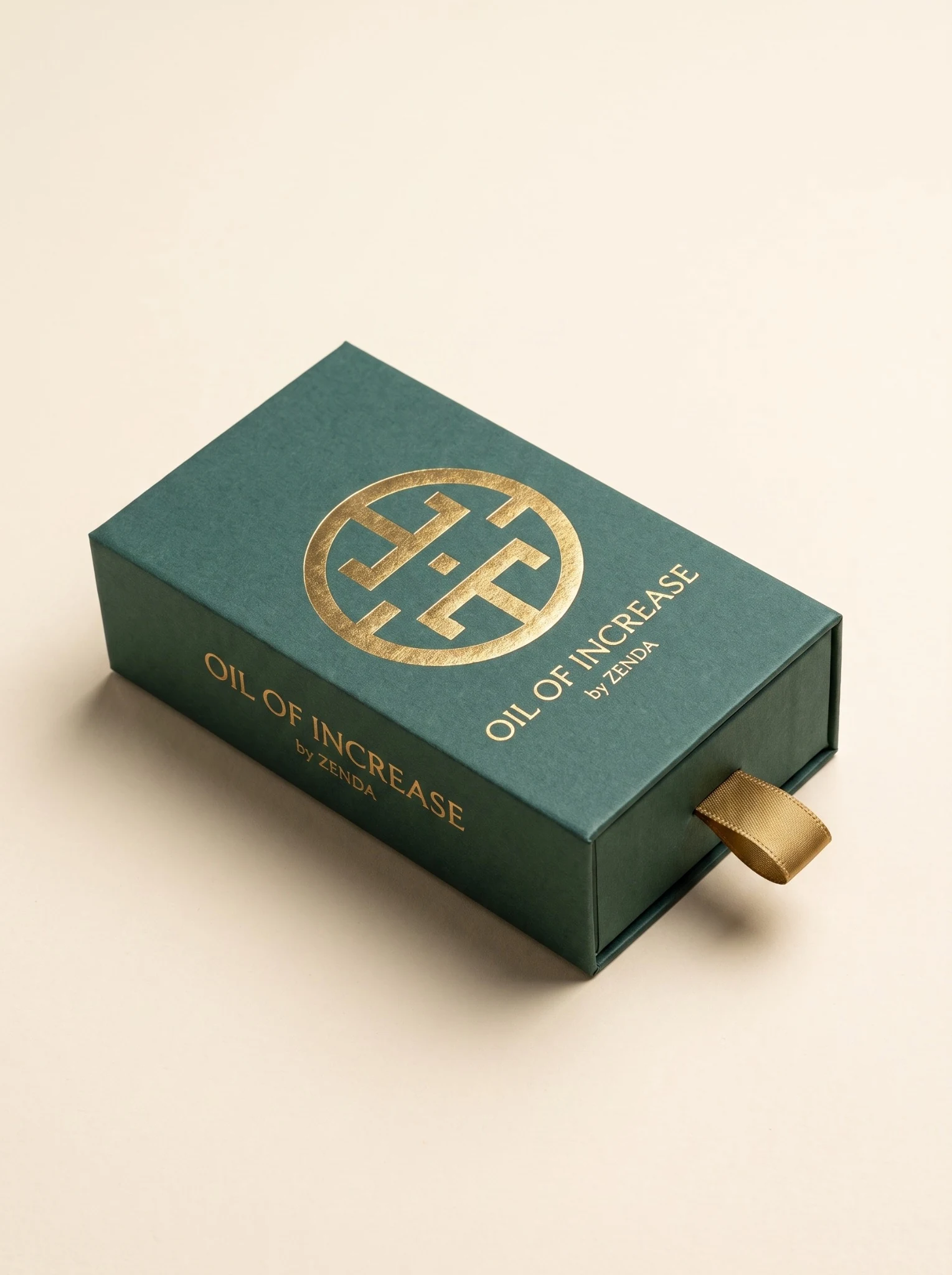 The jade slide-drawer box with gold foil, Oil of Increase by Zenda